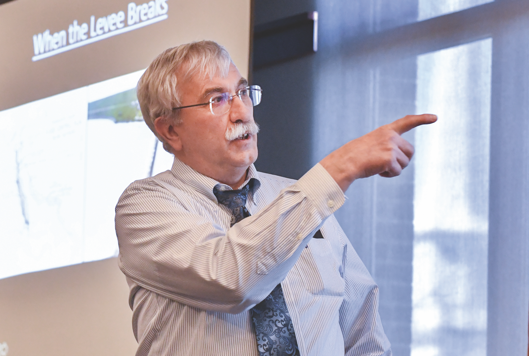 Robert Duval, professor at the School of Public Health, discusses the importance of water and other points of public health in a changing climate during Academic Media Day at the Erickson Alumni Center. The event brought together several WVU experts on climate to discuss with members of the media who attended the series hosted by University Relations.